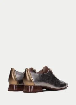 Sapatos rasos dali ouro-aço